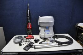 A HOOVER AQUAMASTER WET AND DRY VACUUM CLEANER with accessories and a Ewbank Chili vacuum