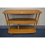 AN ERCOL ELM AND BEECH MODEL 361 WINDSOR THREE TIER TROLLEY BOOKCASE, on casters, width 92cm x depth