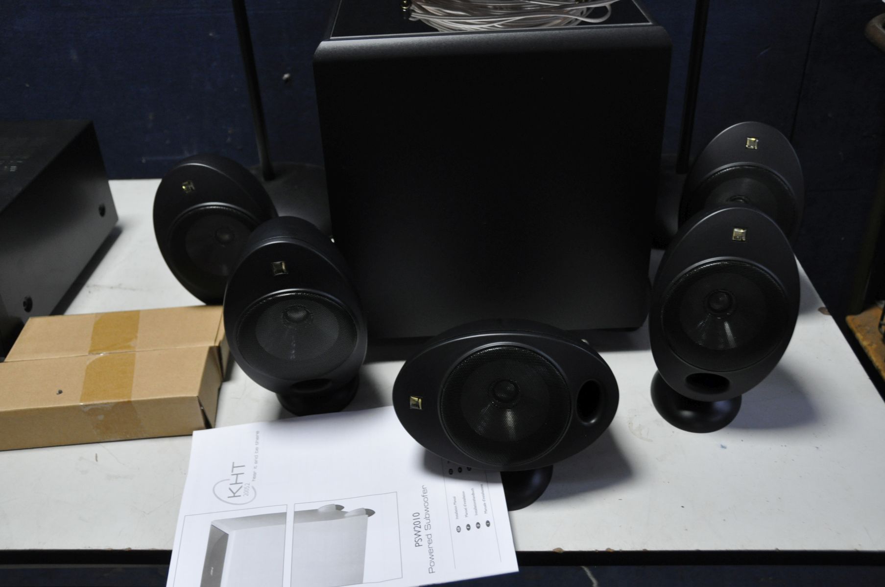 A BOXED KEF KHT 2005.2 SUB WOOFER AND FIVE SURROUND SOUND SPEAKERS with cables and manual (all - Image 2 of 2