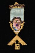 A CASED YELLOW METAL MASONIC MEDAL, blue and white enamel, with a hand painted miniature portrait of