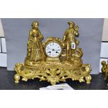 A MID 19TH CENTURY GILT METAL FIGURAL MANTEL CLOCK, cast with a young lady and gentleman in 18th