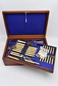 A COMPLETE CANTEEEN OF CUTLERY, wooden canteen with brass inlayed handles, opens to reveal three