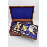 A COMPLETE CANTEEEN OF CUTLERY, wooden canteen with brass inlayed handles, opens to reveal three