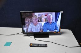 A SHARP LC-24DHF 24in LCD SMART TV/DVD with remote (PAT pass and working)