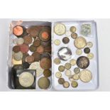 A TIN CONTAINING A SMALL AMOUNT OF MIXED COINS to include three silver Kennedy half dollars, an