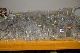 A GROUP OF CUT GLASS, to include whisky, brandy, wine, port and sherry etc, some sets of four,