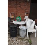 A WHITE PLASTIC GARDEN TABLE 91cm diameter, four matching chairs, three step ladders, folding