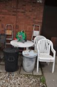 A WHITE PLASTIC GARDEN TABLE 91cm diameter, four matching chairs, three step ladders, folding