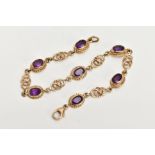A 9CT GOLD AMETHYST LINE BRACELET, designed with seven oval cut amethysts, each with a collet