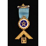 A 9CT GOLD AND ENAMEL MASONIC MEDAL, for the 'Mercia Lodge No.3995' W.M 1956-57, blue and white
