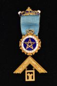 A 9CT GOLD AND ENAMEL MASONIC MEDAL, for the 'Mercia Lodge No.3995' W.M 1956-57, blue and white