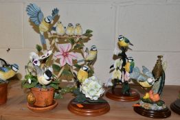 ELEVEN COUNTRY ARTISTS AND BORDER FINE ARTS SCULPTURES OF ROBINS, BLACKBIRDS AND TITS, including