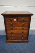 A SMALL EARLY 20TH CENTURY MAHOGANY COLLECTORS CABINET, made up of two short and five long