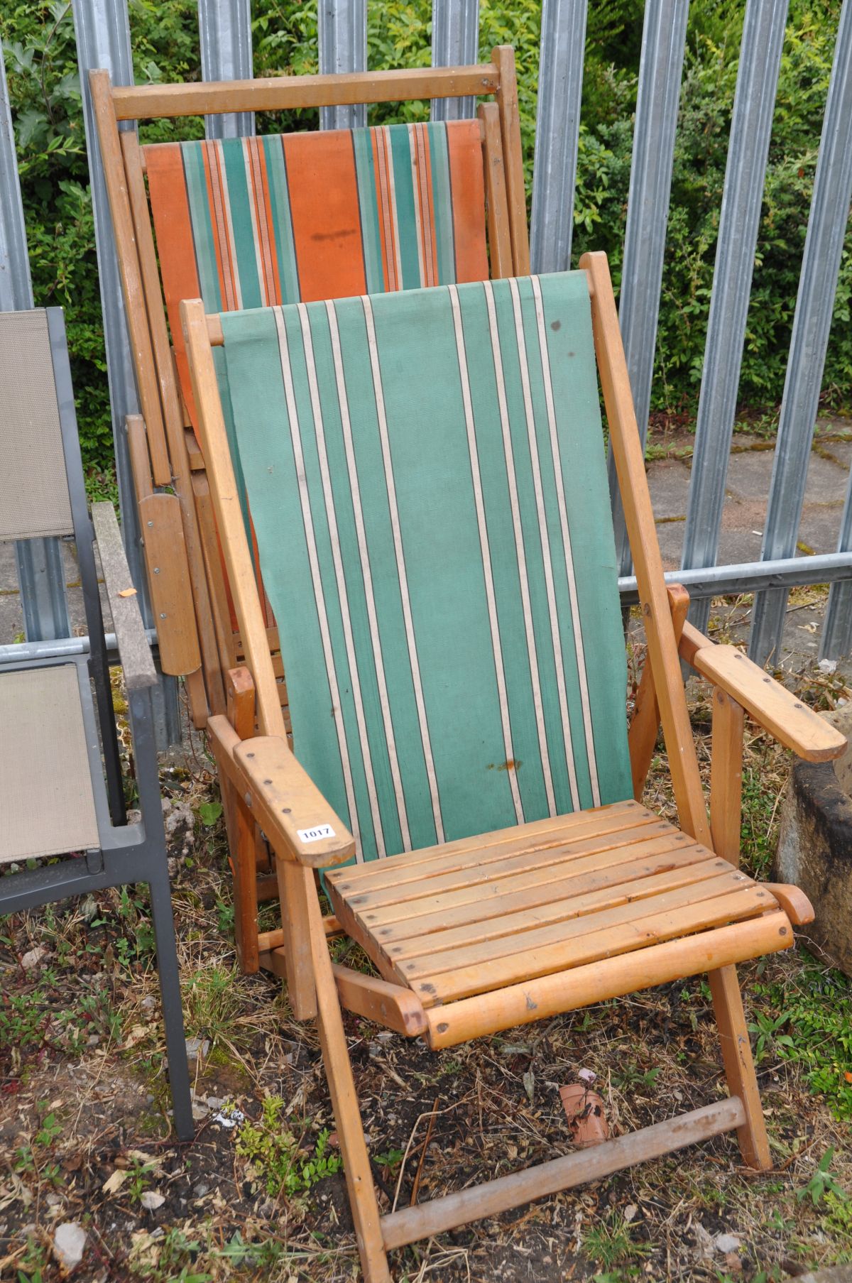 TWO MID 20TH CENTURY DECK CHAIRS with fabric backs and slatted seats width between arms 49cm (2)