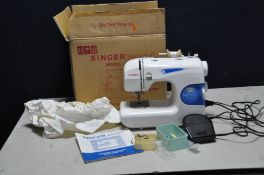 A SINGER MODEL 117 FEATHERWEIGHT 2 SEWING MACHINE with foot pedal, accessories, manual, and box