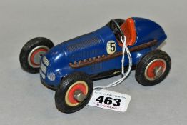 AN UNBOXED SCHUCO STUDIO 1050 CLOCKWORK RACING CAR, runs when wound, missing key, in blue with