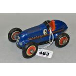 AN UNBOXED SCHUCO STUDIO 1050 CLOCKWORK RACING CAR, runs when wound, missing key, in blue with