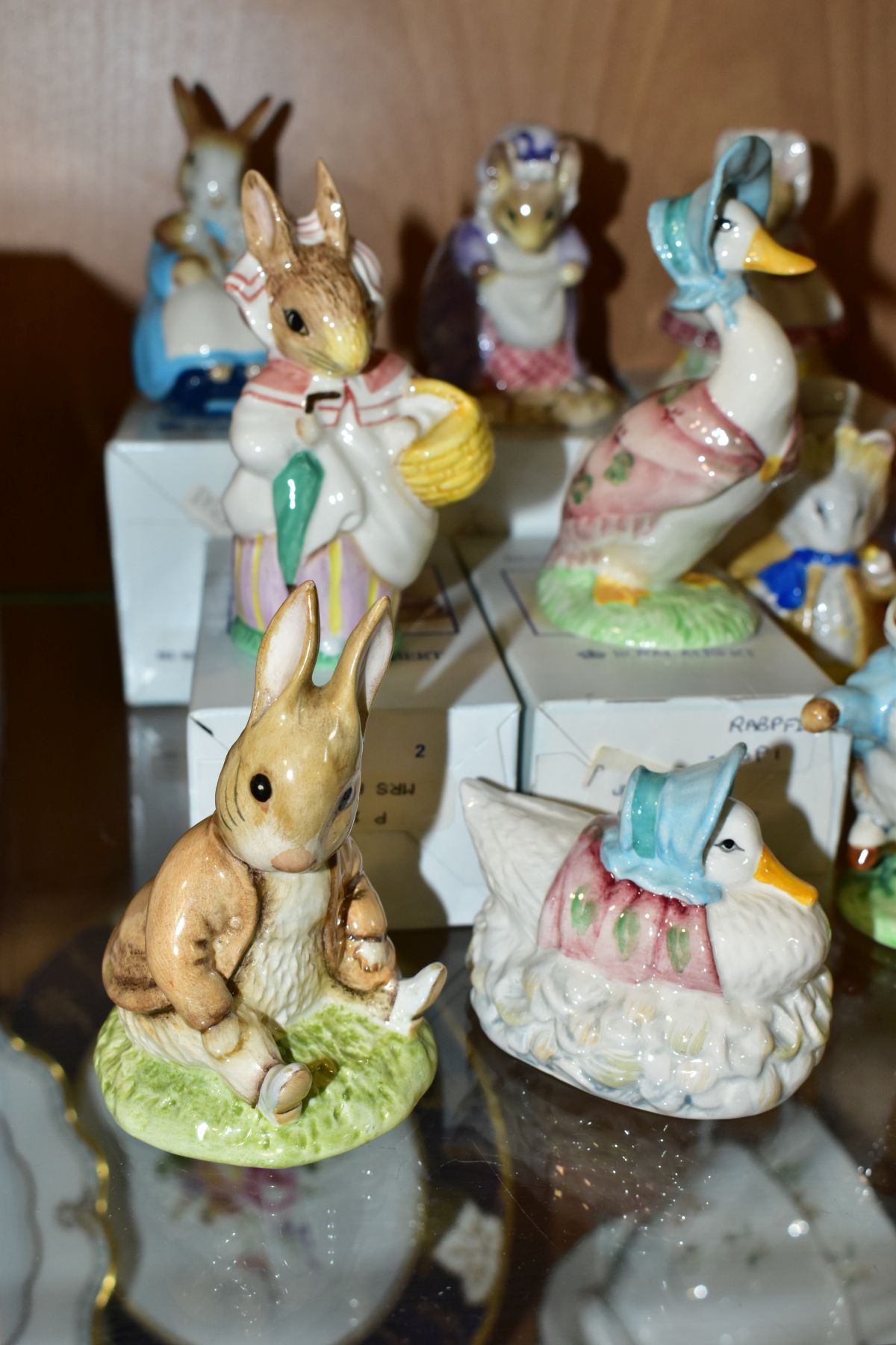 ELEVEN BEATRIX POTTER FIGURES, comprising six Beswick Flopsy, Mopsy and Cottontail, Amiable Guinea- - Image 2 of 12