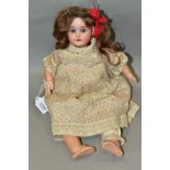 A SCHOENAU & HOFFMEISTER BISQUE HEAD DOLL, nape of neck marked '4000 4/0 SH with PB inside five