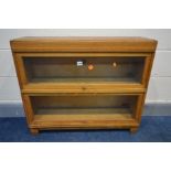 A GLOBE WERNICKE LIGHT OAK TWO SECTIONAL BOOKCASE, with glazed fall front doors, width 85cm x