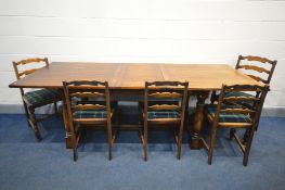 A REPRODUCTION GEORGIAN STYLE OAK EXTENDING TABLE, with one additional leaf, length 230cm x depth