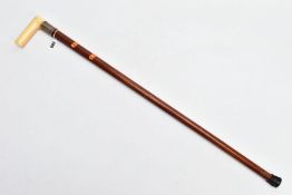 A LATE VICTORIAN WALKING STICK, the wooden stick (believed to be Malacca) with plain banded silver