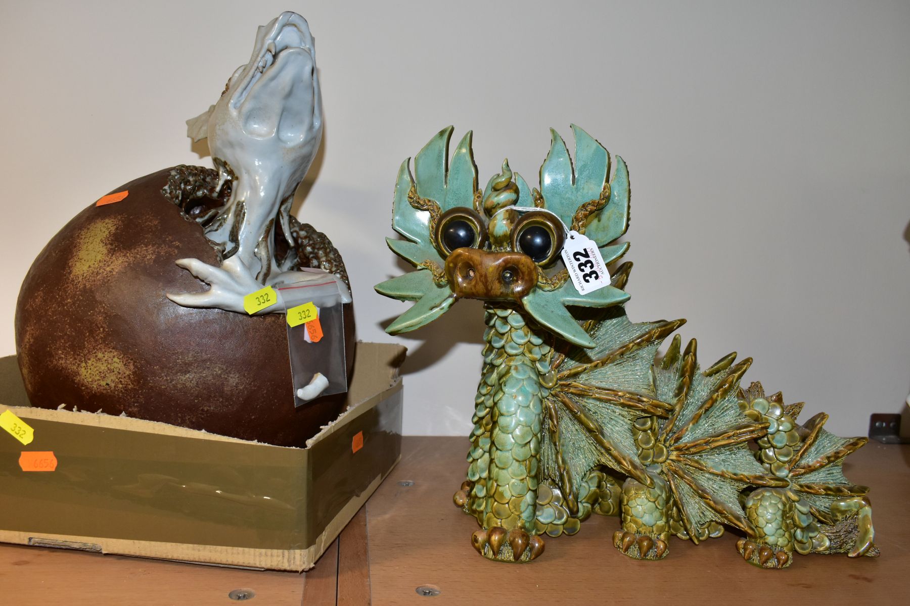 A LARGE YARE DESIGNS ENGLAND POTTERY DRAGON, with paper label to base, height 28cm x length 36cm,