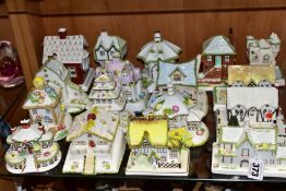 A COLLECTION OF SEVENTEEN COALPORT COTTAGES AND BUILDINGS, comprising 'Country Railway Station', '