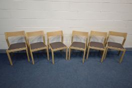 A SET OF SIX MATTHEW HILTON FOR CASE PROFILE CHAIRS, made from solid oak with brown leather seat pad