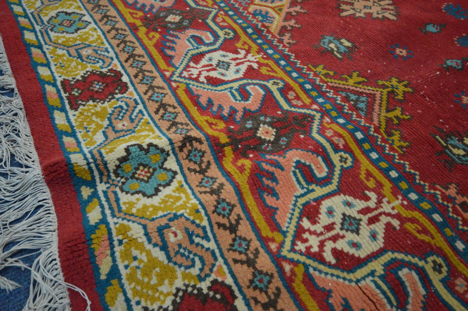 A WOOLLEN PERSIAN BAKSHAISH RUG, geometric motif within a red field, and a multi strap border, 297cm - Image 4 of 5
