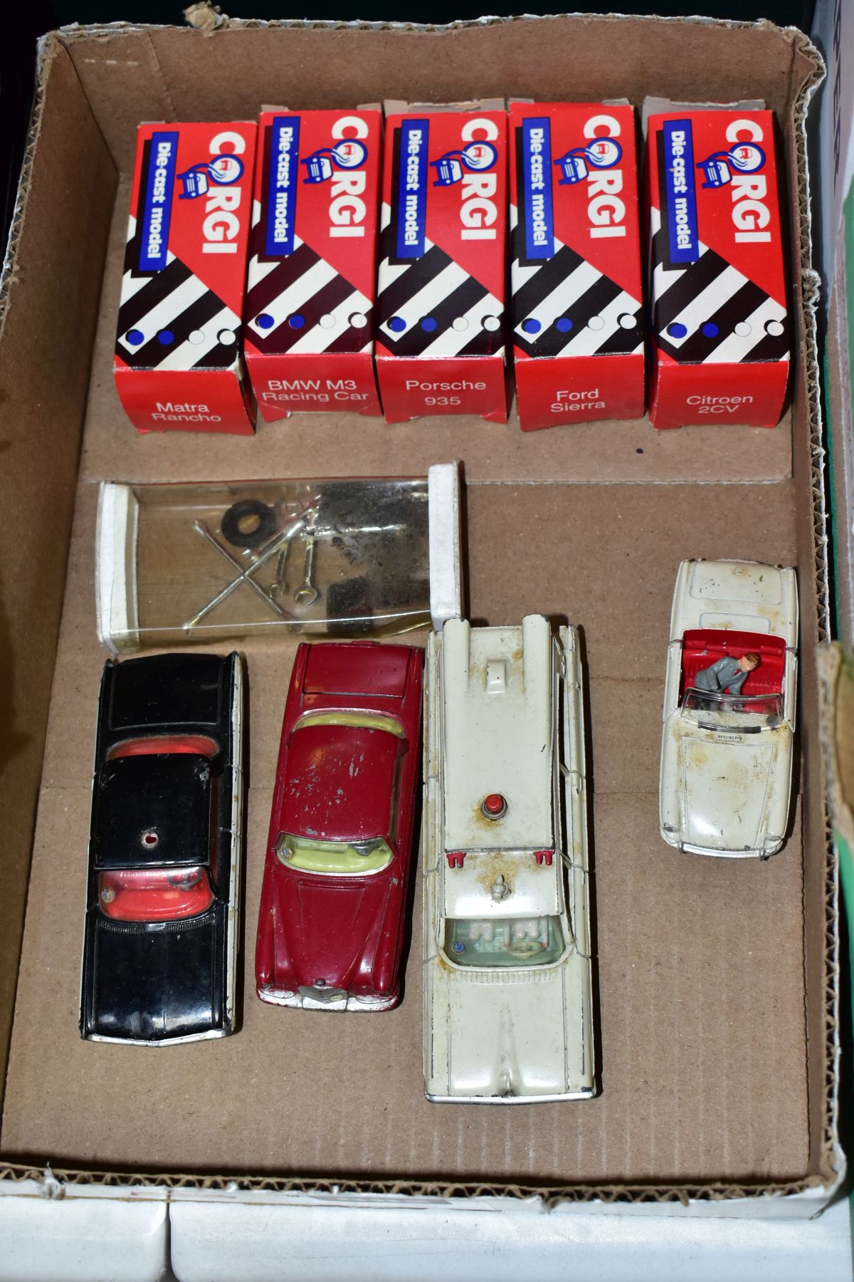 A QUANTITY OF BOXED AND UNBOXED PLAYWORN DIECAST VEHICLES, unboxed Dinky Toys M.G.B. Sports car,