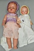 AN ARMAND MARSEILLE BISQUE HEAD BABY DOLL, nape of neck marked 'A M Germany 351/ 2½ K' and has the