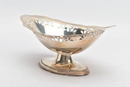 A SILVER PIERCED BONBON DISH, plain polished design, oval form with pierced detail, on a stepped