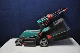 A BOSCH ROTAK 340 ER ELECTRIC LAWN MOWER with grass box (PAT fail due to joined cable but working)