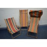 THREE VINTAGE DECK CHAIRS, one with a hood