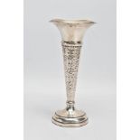 A SILVER STEM VASE, of conical form with hammered detail, flared undulating rim and a weighted base,