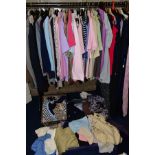 A QUANTITY OF LADIES CLOTHING AND A SMALL QUANTITY OF GENTS CLOTHING, in boxes and loose,