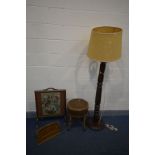 A VICTORIAN MAHOGANY FLUTED STANDARD LAMP, with a rattan shade, converted from a bed post (repair to