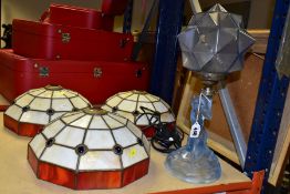 A CIRCA 1930'S WALTHER & SOHNE TABLE LAMP in the form of a female figure holding a geometric lamp