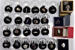 TWENTY SEVEN SILVER AND WHITE METAL RINGS, to include two set with marcasite, one with an oval piece