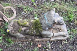 A GARDEN FIGURE OF A RECUMBANT LION on a rectangular base (one piece) with a clean break to base and