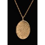 A 9CT OVAL LOCKET AND CHAIN, an oval locket with scroll engraving measuring approximately 40.0mm x