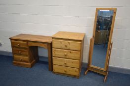 A QUANTITY OF PINE BEDROOM FURNITURE to include a desk with three drawers, chest of four deep