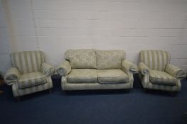 A CREAM AND BEIGE TWO SEAT SETTEE with floral upholstery, inner width 140cm and a pair of similar