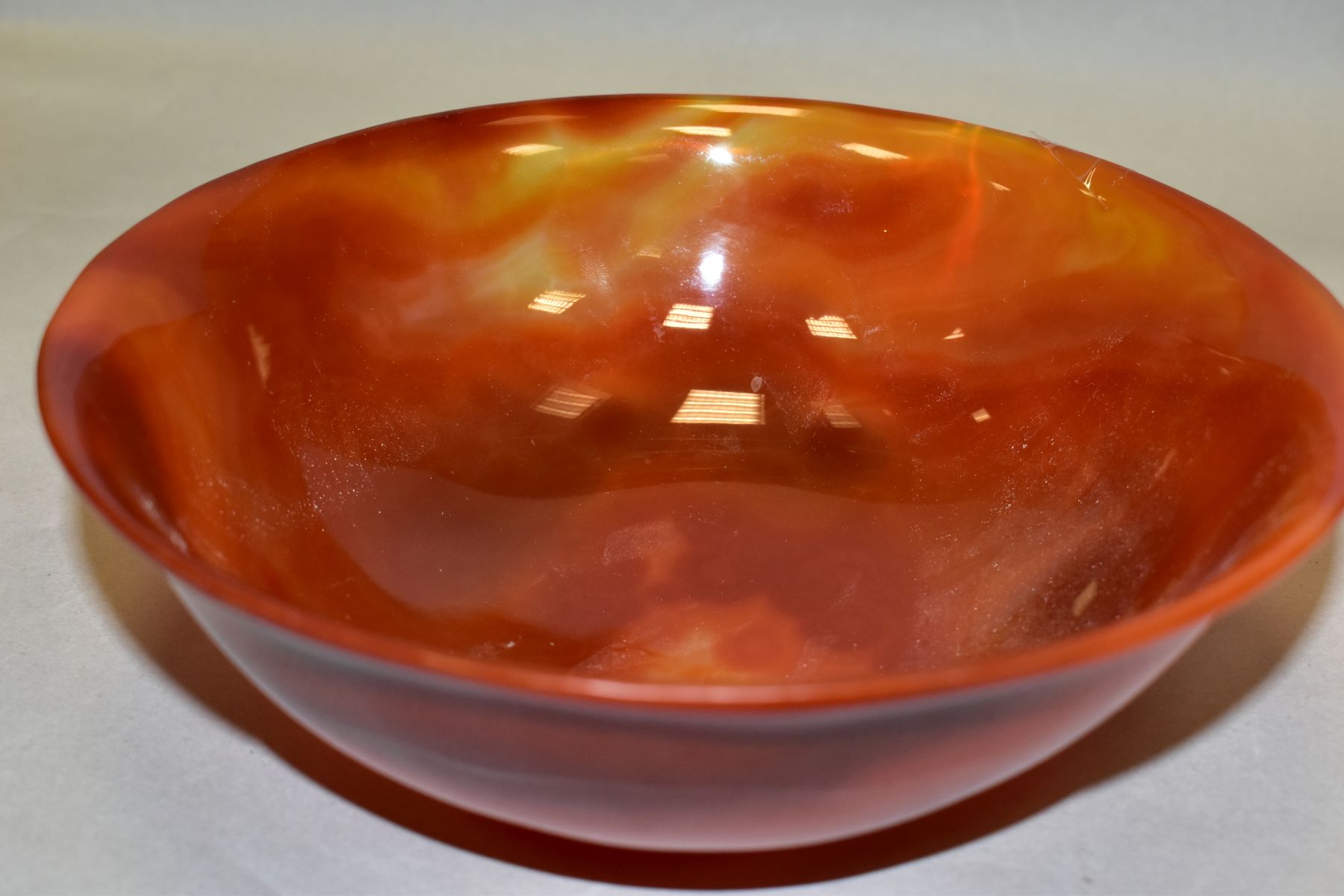 A CHINESE AGATE BOWL, semi translucent striated amber tones, short circular foot, diameter 18.8cm, - Image 8 of 9