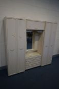 A FRENCH STYLE THREE PIECE BEDROOM FITMENT, overall width 194cm x depth 50cm x height 187cm