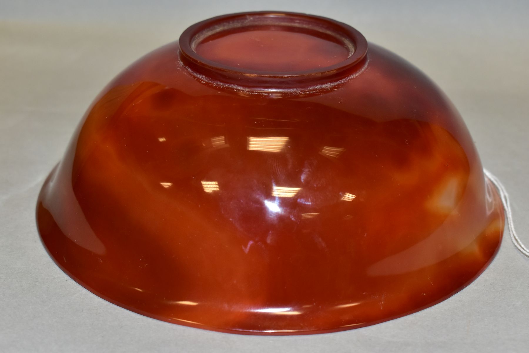 A CHINESE AGATE BOWL, semi translucent striated amber tones, short circular foot, diameter 18.8cm, - Image 7 of 9