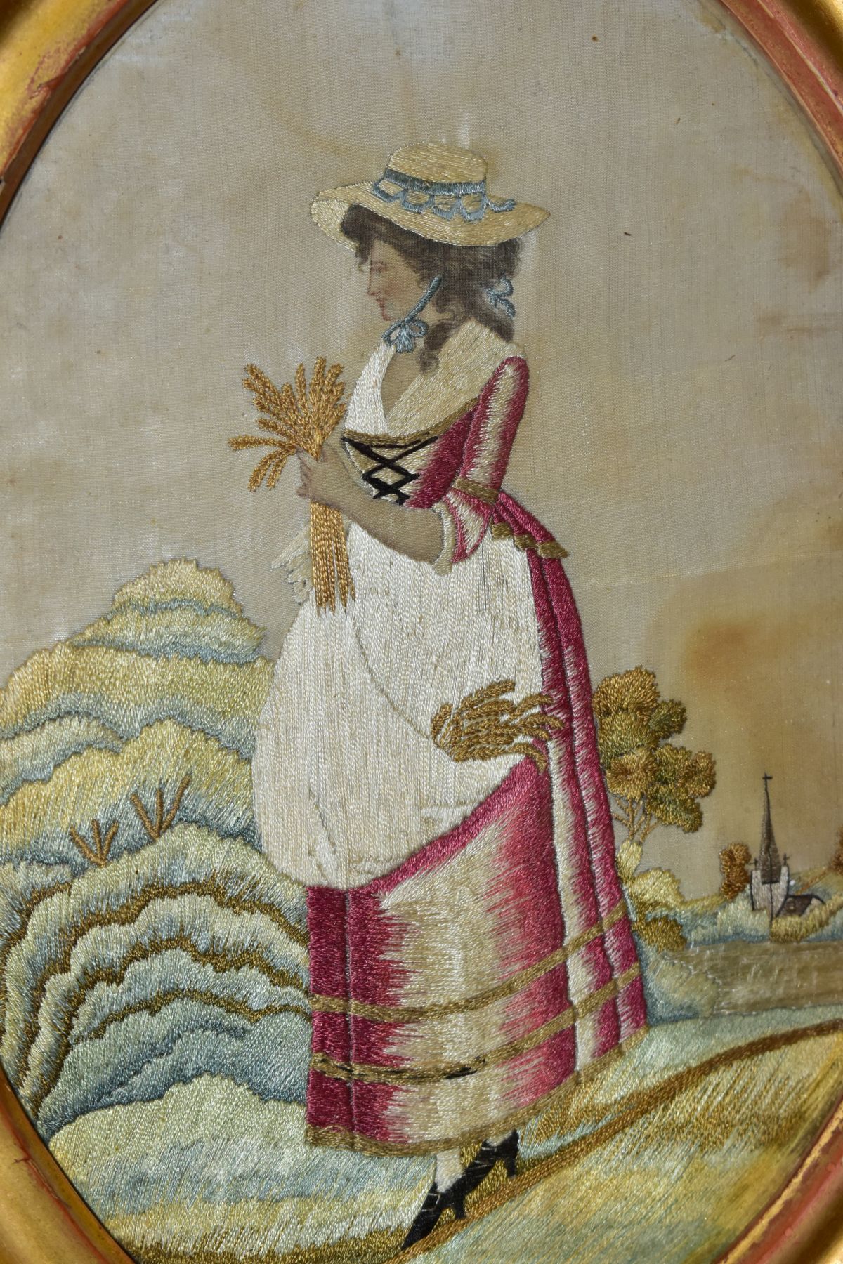 A LATE 18TH CENTURY EMBROIDERED SILKWORK PICTURE OF A LADY HARVESTING CORN, church to the - Image 3 of 5