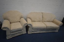 AN BEIGE UPHOLSTERED TWO PIECE LOUNGE SUITE, comprising a settee, length 197cm and an armchair,