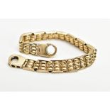 A 9CT GOLD BRACELET, the articulated bracelet designed with triple banded links, fitted with a